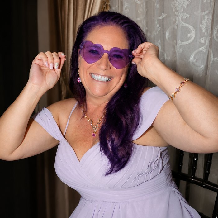 Brandy dressed up in purple
